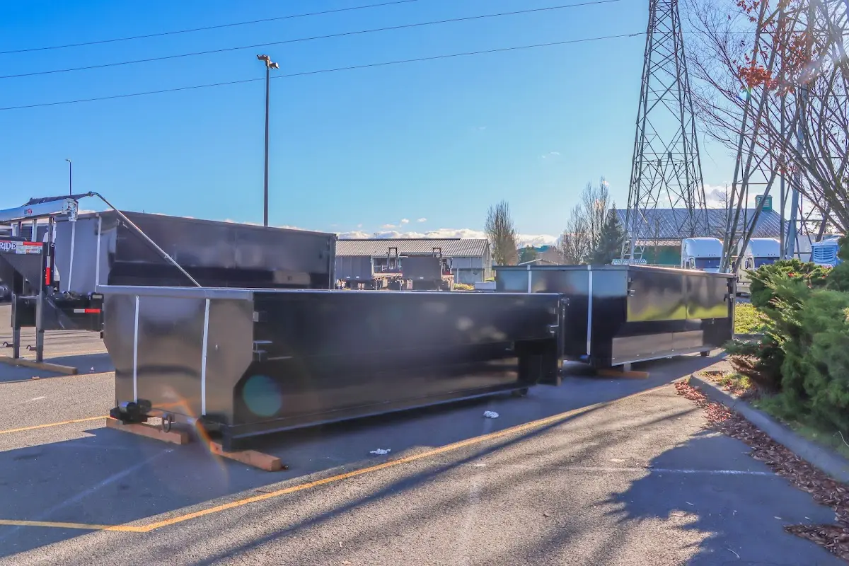 Roll-off dumpster ready for waste disposal at job site for Roofing Dumpster Rental in Newington